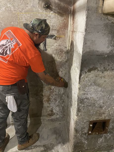 Below-grade waterproofing testing we perform on a residential basement perimeter wall.