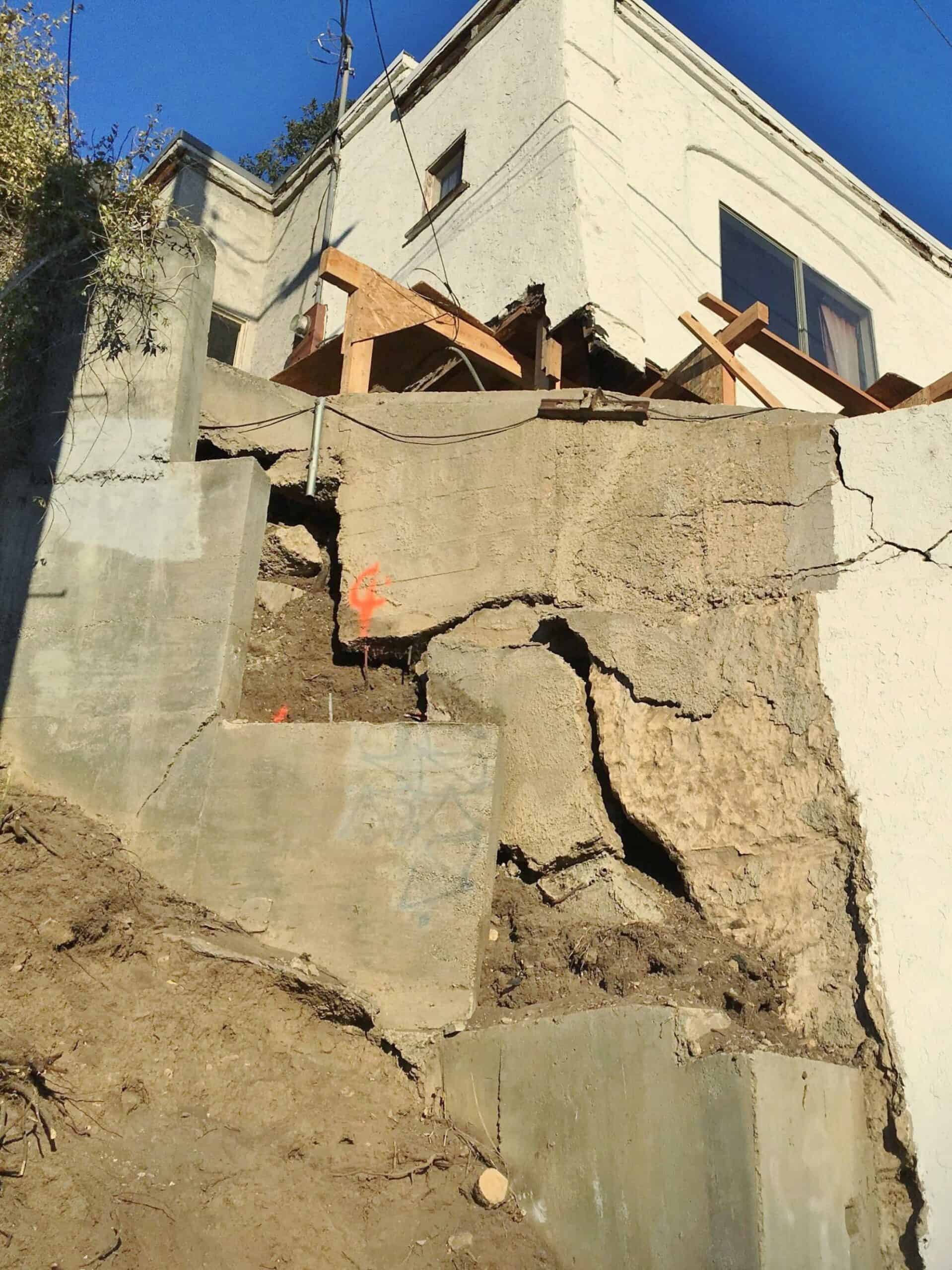 Beverly Hills hillside home showing retaining wall failure caused by hillside creep.