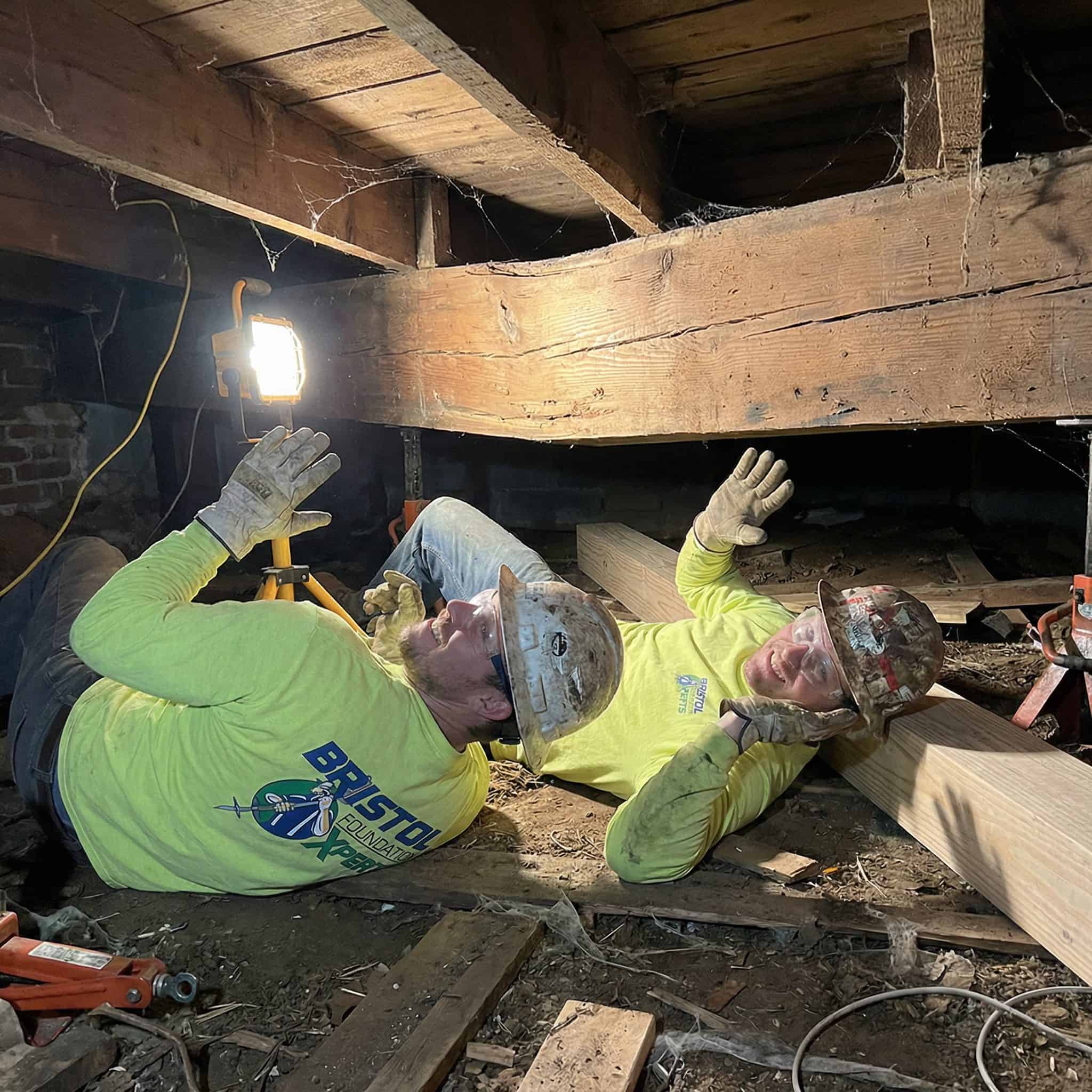 Avari Foundation Repair Services technician working on crawlspace beam replacement.